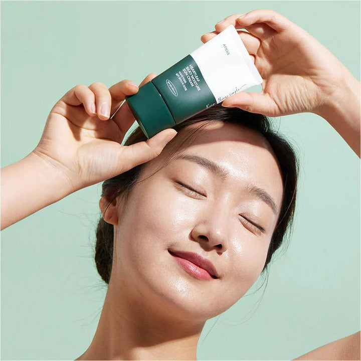 Silky texture sun cream  in  model hand