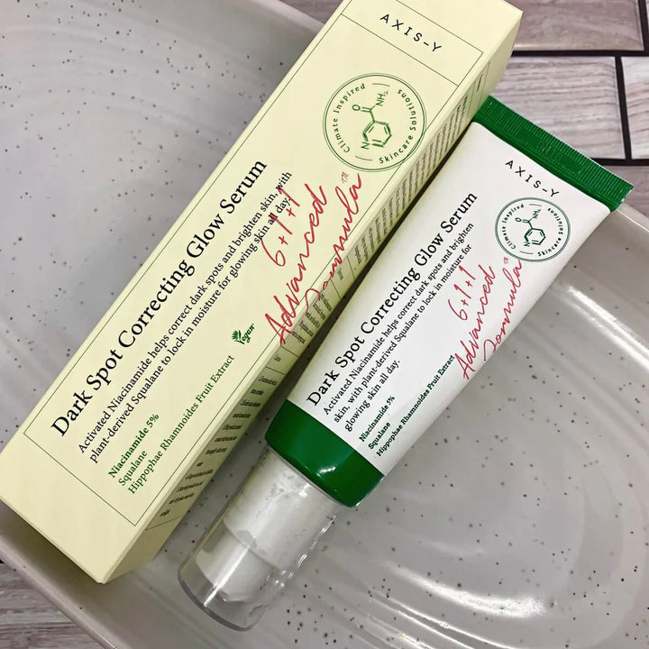 Serum bottle with outer packaging side view