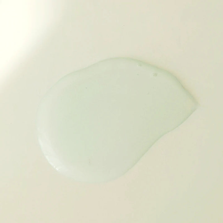 Texture close-up of cleanser gel on hand, showing clarity and hydration