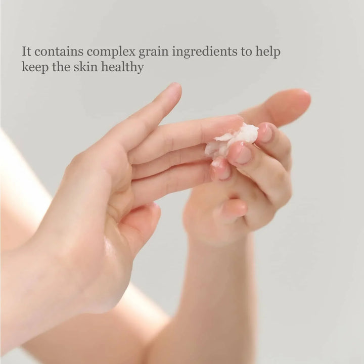 Texture close-up of Radiance Cleansing Balm melting into oil on hand