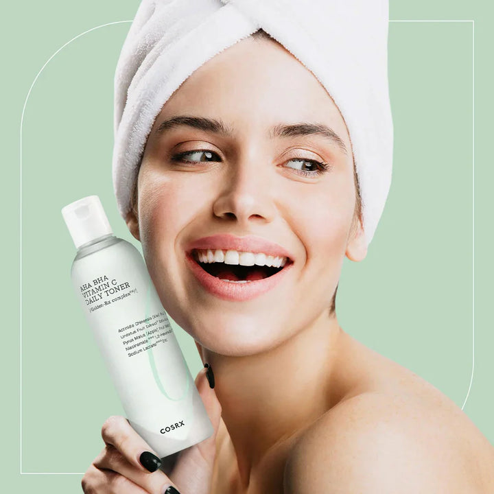 Applying COSRX Refresh AHA BHA Vitamin C Daily Toner for Glowing and Smooth Skin