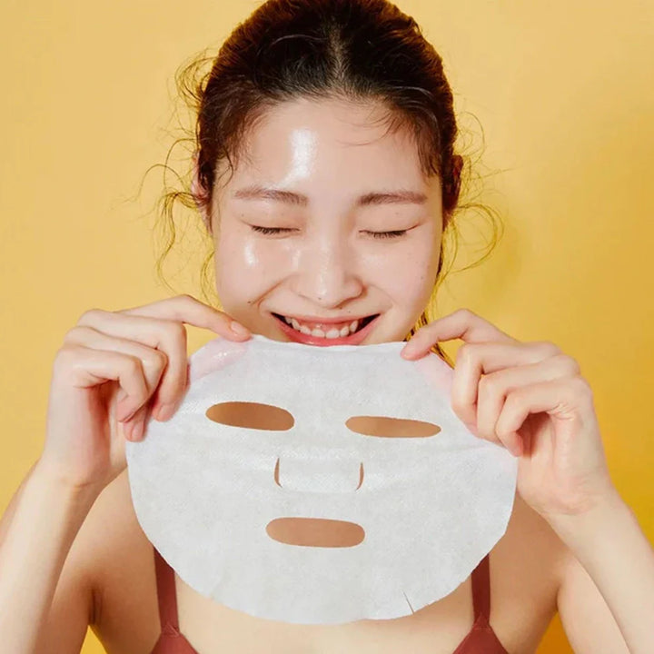 Applying COSRX Propolis Nourishing Magnet Sheet Mask for Deep Hydration