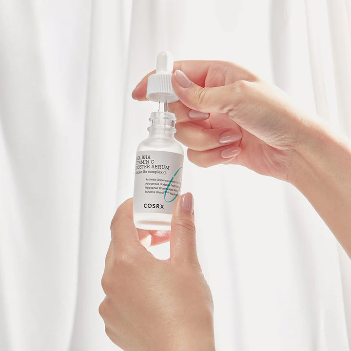 Applying COSRX Refresh AHA BHA Vitamin C Booster Serum for Bright Skin