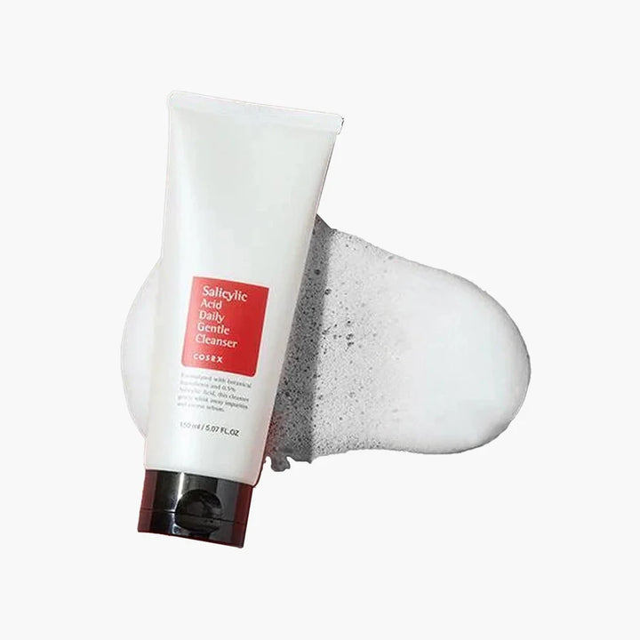 COSRX Salicylic Acid Cleanser tube on foamy texture background