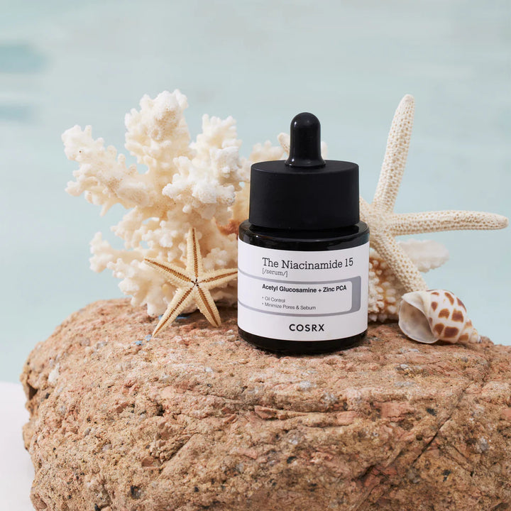 “Product flatlay: COSRX Niacinamide 15 Serum with other COSRX serums for brightening & acne care”