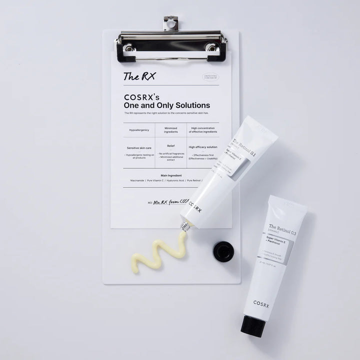 “Product flat lay – COSRX Retinol 0.1 Cream alongside moisturizer and sunscreen”