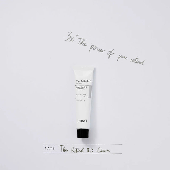 Model applying COSRX Retinol 0.3 Cream to cheek as part of anti-aging skincare