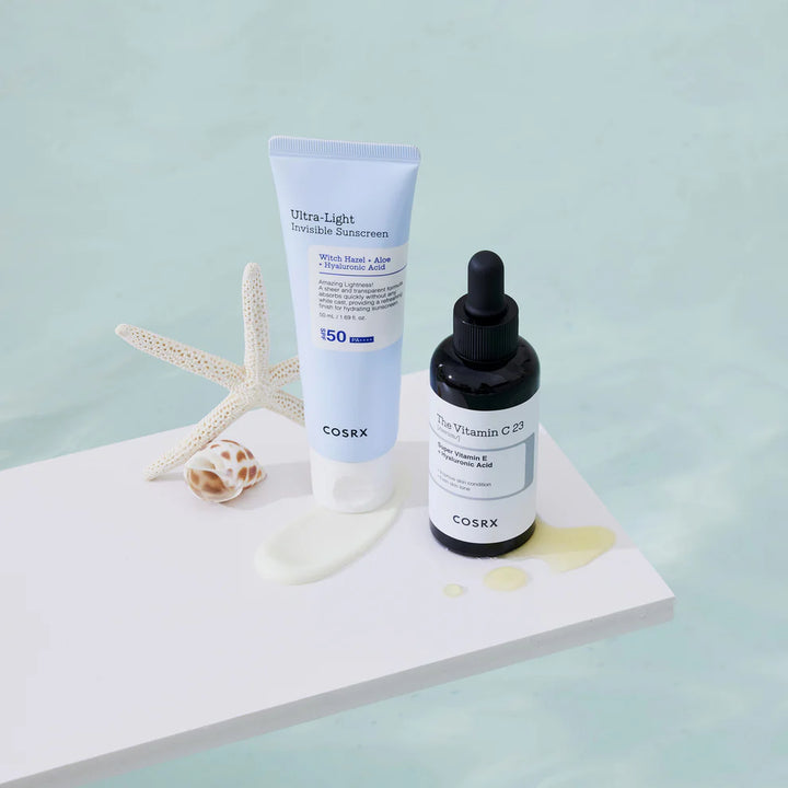 “COSRX Ultra-Light Invisible Sunscreen SPF50 paired with Vitamin C23 Serum – anti-aging sun care combo”