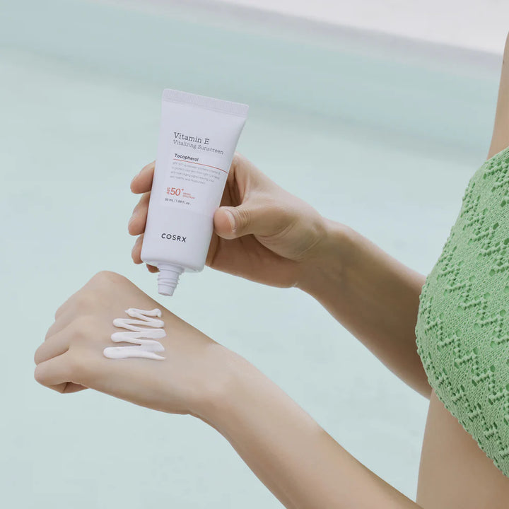 COSRX Vitamin E Vitalizing Sunscreen Smooth Lightweight Cream Texture
Applying COSRX Vitamin E Vitalizing Sunscreen SPF 50 for Hydration & Protection